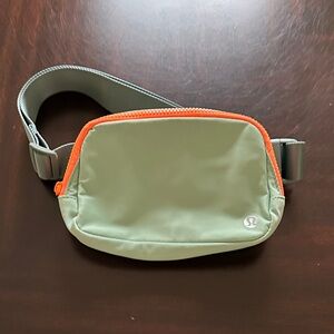 lululemon athletica Belt Bag in Green with Orange Trim